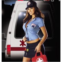 a woman in uniform is standing next to a ambulance truck and holding a red bag