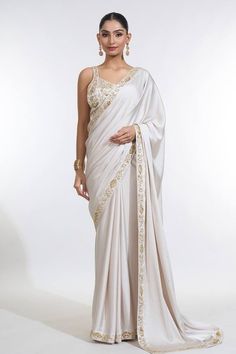 Ivory armani satin saree with a floral sequin and bead embroidered border. Paired with a floral embroidered padded blouse. - Aza Fashions Ivory Saree, Padded Blouse, Border Saree, Satin Saree, Embroidered Border, Set For Women, Indian Outfits, Aza Fashion, Western Fashion