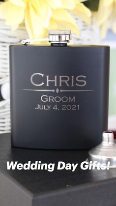 a black flask with the words wedding day gifts on it