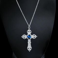 "18\" Gothic Cross Necklace 021-BLUE Large Silver Gothic Cross Pendant with Blue Crystal Center. Stainless Steel Chain. Chain Extender for Size Adjustment. Lobster Clasp. CB159 #cross #necklace #gothic #gothiccross #jewelry Goth, Punk, Avant Garde, big, Modern, Handmade, Silver, Red" Gothic Blue Metal Jewelry, Blue Gothic Metal Jewelry, Blue Gothic Metal Necklace, Gothic Blue Jewelry For Gifts, Blue Gothic Jewelry For Gifts, Blue Gothic Jewelry For Gift, Blue Cross Necklace For Gift, Blue Crucifix Jewelry As Gift, Blue Crucifix Jewelry For Gift