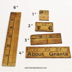 wooden rulers are arranged in the shape of a christmas tree with words about giants written on them