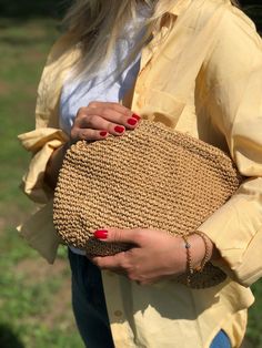 HANDMADE STRAW POUCH CLUTCH BAG 🛍️Inspired by nature sustainable fashion ✅Any woman must have this bag for every fashionista.Whether you keeping it to yourself or gifting someone you care, it will be unforgettable. Daily use, a fashionable women's accessory for special occasions ✅I made this beautiful clutch from natural paper rope which is organic cotton. ✅The interior of the straw summer bag is fully lined with cotton and has a hidden metal lock. A lining of the appropriate color is sewn into the crochet raffia bag.  ✨Handmade products ✨Natural raffia yarn ✨Premium duck (a special kind of fabric) lining ✨Ultra-careful craftsmanship   ✨High-quality special products for you  ✅You can combine your clothes with a straw summer bag on summer days. Suitable for use as handbag, make-up bag or p Everyday Clutch With Braided Handles, Chic Natural Color Straw Clutch Bag, Eco-friendly Natural Rectangular Pouch, Casual Natural Rectangular Clutch, Natural Woven Pouch Shoulder Bag, Natural Straw Pouch Bag For Spring, Natural Woven Straw Clutch, Natural Straw Clutch Bag For Spring, Natural Woven Clutch For Everyday Use