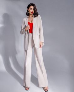 Blazer length 30 1/3 inches or 77 cm Sleeve length is 24,6 inches or 62,5 cm Pants length 47,2 in or 120 cm Inseam 34,6 inches or 88 cm 2-piece womens blazer trouser suit for office, business meetings, formal events and special occasions DETAILS -  straight long pants -  high rise -  blazer is buttoned -  blazer is characterized by uneven bottom: back is longer than the front part -  lined MATERIAL Premium quality suiting fabric, which consists of viscose mostly and a bit of polyester and elastane SIZES The models in photos are wearing a size S (4) Available in 4 sizes: 2 US numeric  BUST 32-34 inches or 82-86 cm WAIST 23-24.8 inches or 59-63 cm HIPS 33-35 inches or 86-90 cm 4 US numeric  BUST 34-35 inches or 86-90 cm WAIST 25-26 inches or 63-67 cm HIPS 35-37 inches or 90-94 cm 6 US numeri Spring Suits With Pockets, Beige Formal Pantsuit With Pockets, Spring Full-length Suits With Pockets, Spring Full Length Suits With Pockets, Workwear Sets With Pockets, Spring Full-length Blazer For Workwear, Elegant Full-length Pantsuit With Pockets, Tailored Solid Suits With Straight Pants, Beige Trousers Pantsuit For Office