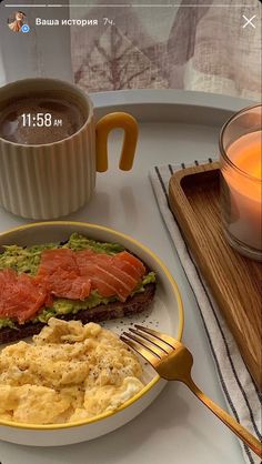 the meal is prepared and ready to be eaten on the table with coffee in the background