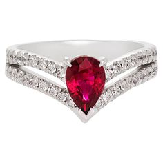 Pear Ruby Ring, Formal Pear-shaped Ruby Ring, Formal Red Pear-shaped Ruby Ring, Classic Ruby Ring With Pear-shaped Stone, Classic Ruby Ring With Heart Cut For Formal Occasions, Diamond Ruby Ring With Prong Setting In Pear Shape, Classic Heart Cut Ruby Ring For Formal Occasions, Classic Pear-shaped Ruby Ring With Prong Setting, Pear-shaped Ruby Diamond Ring With Prong Setting