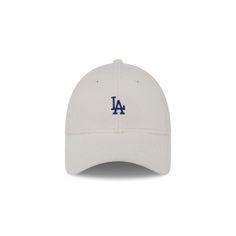 The Los Angeles Dodgers Cozy Women's 9FORTY Adjustable Hat features an embroidered Dodgers mini logo at the front panels with a gray undervisor and an adjustable D-Ring closure at the rear. Gray Baseball Cap With Embroidered Logo For Streetwear, Gray Casual Fitted Hat For Baseball Season, Casual Gray Fitted Hat For Baseball Season, Casual Six-panel Hat With Logo, White Winter Baseball Cap With Curved Brim, Sporty Gray Hat For Baseball Season, Gray Baseball Cap With Embroidered Logo, White Curved Brim Baseball Cap For Winter, Casual Adjustable Dad Hat With Logo