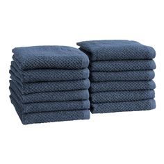 stack of blue towels on white background