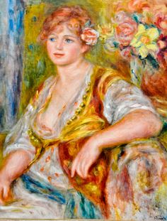 a painting of a woman sitting on a chair with flowers in her hair and wearing a yellow dress