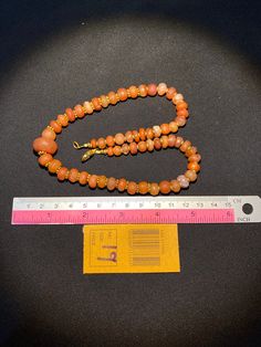 Ancient Indo-Tibetan agate beads necklace very beautiful color and very smooth skin of this agates we provide fast and free shipping to our customers by which can get the items by 7 maximum working days Orange Gemstone Beads For Jewelry Making, Orange Beads Gems And Cabochons For Gift, Vintage Orange Hand-strung Beaded Necklaces, Vintage Hand-strung Orange Beaded Necklace, Vintage Orange Hand-strung Beaded Necklace, Natural Stone Round Orange Beads, Vintage Orange Beads, Gems, And Cabochons For Gifts, Vintage Orange Gemstone Beads, Orange Gemstone Round Beads