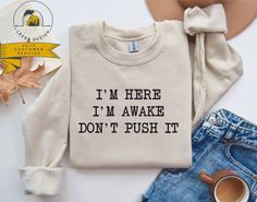 I'm Here I'm Awake Don't Push It Sweatshirt | Funny Saying Sweater | Teen Sweatshirt | Sarcasm Gift Sweatshirt | Trendy Sweatshirt  How to Order 1* View all color and size charts before you place your order. 2* Select your shirt "SIZE" and "COLOR". 3* Select your design/text color and enter the color into "Add your personalization" box such as black or white etc. 4* Select the quantity  5* Click add to cart.  If you are ordering more than 1 item, you need to repeat this process for each item you Funny Sweatshirts For Women, Sweatshirt Vinyl Ideas, Sweatshirts Cricut, Cute Sweatshirt Designs, Vinyl Sweatshirt Ideas, Sweater Design Ideas, Cricut Sweatshirt Ideas, Sweatshirt And Shirt Outfit, Im Awake