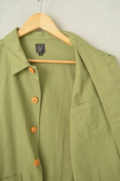 "Unisex 60s Style French Army Green Cotton Twill Canvas Chore Jacket Get back to basics with this timeless garment that symbolises style and utility blended into one. Limited quantities available. Also available in: - Black - Duck Brown - Navy Blue - Olive Green - Cobalt Blue - Desert Beige - Chalk Blue Made to a 100% unique design specification, as designed by us at Wolf Vintage; not to be found anywhere else on the market, online or in store. Having specialised in selling vintage navy chore ja Green Utility Jacket With Welt Pockets For Work, Everyday Green Utility Jacket With Button Closure, Olive Cotton Utility Jacket With Button Closure, Green Utility Jacket With Buttons For Workwear, Green Utility Jacket With Lapel Collar For Workwear, Green Utility Jacket With Snap Buttons For Work, Olive Cotton Outerwear With Buttons, Vintage Green Utility Jacket For Work, Green Cotton Utility Jacket With Buttons