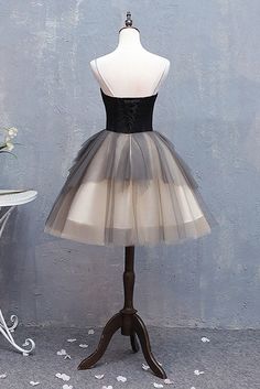 Black Tulle Mini Dress For Prom Season, Black Strapless Tulle Corset Dress, Black Mini Length Corset Dress For Wedding, Black Mini Dress With Corset Back For Wedding, Black Tulle Corset Dress For Prom, Elegant Black Sleeveless Tutu Dress, Elegant Black Tulle Tutu Dress, Elegant Black Tutu Dress, Black Elegant Tutu Dress