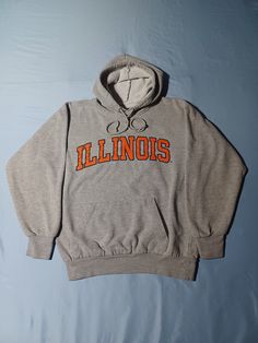 Beautiful quality OG Illinois Hoodie! Great collegiate style and great vintage feel. Tagged S, but fits bigger. Approx. 21 X 26. See pics for size and details! Classic piece. Vintage 1990s 2000s University of Illinois College Hoodie, Gray MV Sport S M Fall Sports Event Hoodie With Double-lined Hood, Pre-shrunk School Spirit Hoodie For Sports Season, Sporty Sweatshirt With Adjustable Hood For Fans, Collegiate Sweatshirt With Adjustable Hood, Collegiate Sports Hoodie For Fall, Varsity Sports Hoodie With Adjustable Hood, Varsity Hoodie For Fan Gear, Varsity Hooded Hoodie For Fan Gear, Varsity Style Hooded Hoodie For Fan Gear