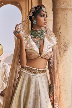 Pink and beige can can attached lehenga with gota, cutdana and pearl embellished floral embroidered motifs. Comes with padded embellished blouse and sequin stripe pattern dupatta. - Aza Fashions Bollywood Style Beige Embellished Sets, Festive Embellished Beige Sets, Embellished Beige Anarkali Sets, Beige Embellished Anarkali Sets, Fitted Beige Lehenga With Dupatta, Fitted Bollywood Style Beige Lehenga, Beige Fitted Lehenga With Dupatta, Beige Choli With Sheer Dupatta, Fitted Beige Bollywood Lehenga