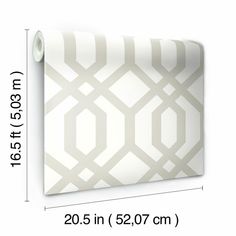 the width of a wallpaper with grey and white geometric designs on it, along with measurements