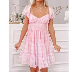 Our Pink Gingham Princess Dress Is A Short Puff Sleeve Gingham Plaid Pretty With Back Tie Detail. Also Available In Red, Blue, And Orange. Fit: Runs True To Size (Model Wearing A Size Small) Content: 100% Polyester New Without Tags Princess Dress Pink, Sassy Shortcake, Pink Plaid Dress, Pink Gingham Dress, Fancy Fits, School Dance Dresses, Pink And White Dress, Short Puff Sleeve, Pink Gingham