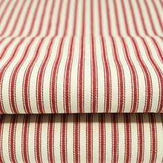 red and white striped fabric folded on top of each other