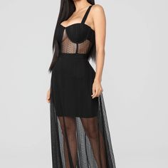 Make A Grand Entrance At Your Next Party Or Cocktail Event In This Stunning Black Maxi Evening Dress. The Dress Features A Beautiful Lace Pattern, Sleeveless Design, And An Off-The-Shoulder Neckline That Adds A Touch Of Elegance To Your Look. The Dress Has A Zip Closure, Ensuring A Comfortable And Secure Fit Throughout The Night. Crafted From Spandex, The Dress Offers A Comfortable Stretch, And The Lace Fabric Type Adds An Extra Touch Of Sophistication. The Long Dress Length Combined With The Ma Sheer Spaghetti Strap Party Dress, Party Dresses With Sheer Spaghetti Straps, Black Sheer Sleeveless Maxi Dress, Sleeveless Black Sheer Maxi Dress, Black Sleeveless Sheer Maxi Dress, Black Maxi Dress With Spaghetti Straps For Party, Black Spaghetti Strap Maxi Dress For Party, Elegant Black Mesh Dress With Spaghetti Straps, Sheer Spaghetti Straps Maxi Dress For Party