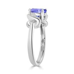 7.5X6.5mm Violetish Blue Tanzanite AAAA Ring Oval shape 1ct with 0.03cttw Diamond in 14K & 18K in White Gold, Yellow Gold & Rose Gold. Product Information SKU TT16319 Metal Type Your choice: 14K, 18K Metal Color Your choice: White Gold, Yellow Gold, Rose Gold Rings Style Cross over Solitaire Metal Weight 3.41 Primary Stone Gemstone Name Tanzanite Gemstone Species Zoisite No. Of Gemstones 1 Gemstone Shape Oval Gemstone Color Violetish Blue Gemstone Grade Your choice: AA Gemstone Clarity VVS Gemst Sapphire Rings, Tanzanite Ring, Tanzanite Gemstone, Blue Tanzanite, 14k Rose Gold Ring, No Heat, Ring Style, White Gold Ring, Blue Gemstones