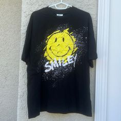 Smiley X H&M Smiley Face Splatter Face Oversized Black Tshirt Women's Size M New With Tags! #4 32824 Gw-C Casual Paint Splatter T-shirt For Streetwear, Casual T-shirt With Paint Splatter For Streetwear, Graphic Tee With Paint Splatter For Streetwear, Streetwear Paint Splatter Graphic Tee, Summer Streetwear Tops With Paint Splatter, Casual Relaxed Fit Paint Splatter T-shirt, Casual Black Top With Paint Splatter, Yellow Short Sleeve Grunge Tops, Yellow Grunge Tops For Streetwear