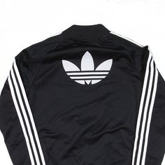 Item is in good used condition. Slight discolouration to right sleeve. Label UK4. >Size: XS >Armpit To Armpit: 15" >Armpit To Cuff: 19" >Collar To Hem: 22" Sporty College Track Jacket With Graphic Print, Casual Black Track Jacket With Graphic Print, Adidas Long Sleeve Track Jacket, Fitted Black Urban Track Jacket, Fitted Black Cotton Track Jacket, Black Sports Outerwear With Logo Print, Sporty Track Jacket With Graphic Print, Black Logo Print Outerwear For Sports, Casual Fitted Track Jacket For College