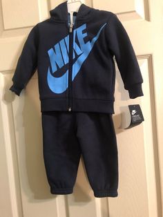 Blue Fleece Tracksuit With Long Sleeves, Blue Fleece Long Sleeve Tracksuit, Blue Fleece Hooded Tracksuit, Blue Hooded Fleece Tracksuit, Blue Long Sleeve Fleece Tracksuit, Blue Cotton Long Sleeve Tracksuit, Blue Long Sleeve Cotton Tracksuit, Blue Fleece Tracksuit For Winter, Blue Tracksuit With Pockets And Long Sleeves