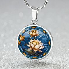 Water Lily Birth Flower Necklace, a stunning piece from our Birthflower collection, features an Engraved Birth Month Flower design, making it an ideal choice for Mothers Day Gifts & Valentines Gifts For Her. ➜ Our Birth Flower Jewelry is made of high quality surgical steel with a graphic image that's printed directly onto the steel surface with a shatterproof liquid glass coating and includes an 18k gold finish option. ➜ Our Engraved Birth Flower Pendant Necklaces are personalized in the U.S.A b Spiritual Birth Flower Pendant Jewelry, Spiritual White Flower Necklaces, Artistic Flower Pendant Necklaces For Gifts, Spiritual Pendant Jewelry With Pressed Flowers, Flower-shaped Engraved Jewelry As Gift For Her, Artistic Flower Pendant Jewelry Gift, Artistic Flower Jewelry For Wedding, Flower-shaped Engraved Jewelry Gift For Her, Artistic Flower Jewelry For Weddings