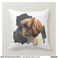 a white and brown dog with black spots on it's face is shown in this pillow