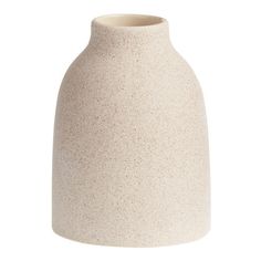 a white vase with speckles on the top and bottom, sitting in front of a white background