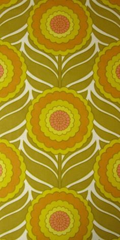 an orange and yellow flower pattern on a white background