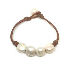 Handmade Adjustable Luxury Pearl Bracelet, Handmade Elegant Leather Bracelet, Elegant Handmade Leather Bracelet, Elegant Round Leather Jewelry, Adjustable Luxury Pearl Bracelet, Elegant Leather Beaded Bracelets With Adjustable Fit, Luxury Adjustable Round Pearl Bracelet, Elegant Round Adjustable Leather Bracelet, Elegant Leather Beaded Bracelets As Gift