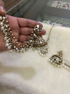 *Beautiful Premium Quality Long Earrings With Support Chain With Maangtikka *Combination Of Kundan and Monalisa Stones  *Front Side is Monalisa Stone With Kundan *Pearls And Kundan Are Of Original Quality *For More Beautiful Collection, Check At https://www.etsy.com/shop/placeoffashion *Earring Closure: Push Back *It is a Bridal or Partywear Earrings *It Will Give You a Unique and Beautiful Look  *You Can Wear This Beautiful Set At Dress or Saaree  *The Colour Combination Of This Set Is Very Uni Elegant Jhumkas With Mirror Work For Navratri, Kundan Jewelry Sets With Latkans For Eid, Pearl Chandbali Temple Jewelry Jhumkas, Kundan Earrings With Pearl Chain For Wedding, Pearl Chandbali Jhumkas In Temple Jewelry Style, Pearl Chandbali Temple Jhumkas, Temple Jewelry Style Jhumkas With Mirror Work For Celebration, Bollywood Pearl Chain Earrings For Festive Season, Festive Chandbali Bridal Necklace With Pearl Drop