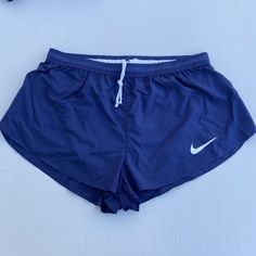 Nike Pro Elite Shorts Mens 2018 Track And Field Mens Sizes Available: Xl, 2xl And 3xl Color: Navy Blue Inseam: 2 Inches Condition: New With Tags. Sporty Blue Swim Trunks With Built-in Shorts, Nike Blue Activewear With Built-in Shorts, Sporty Blue Breathable Swim Trunks, Blue Activewear With Built-in Shorts For Jogging, Breathable Blue Running Bottoms, Functional Blue Shorts For Running, Breathable Blue Shorts With Short Legs, Breathable Blue Shorts, Breathable Blue Athletic Shorts