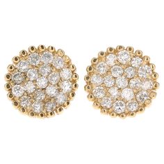 This unique design of diamond earrings have 38 Round Cut Diamonds that weigh 0.46 carats. The Clarity of the diamonds is SI and the Color is F. The total carat weight of the earrings is 0.46 carats. The backing of the earring is a standard push back. The Earrings are made in 14K Yellow Gold and weigh approximately 1.8 grams. The width of the earrings are 9 mm. Yellow Gold Earrings, Yellow Gold Earring, Round Cut Diamond, Round Cut, Gold Earrings, Diamond Earrings, Unique Design, Unique Designs, Jewelry Earrings