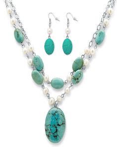 Wow, you'll be sure to make a statement with this stunning necklace and earring set! The beautiful double-chain necklace features oval-shaped turquoise disks and cultured freshwater pearls, plus an eye-catching turquoise pendant at the center. Adjustable length from 17 to 20. Plus, complete your look with the matching earrings in silvertone - perfect for any occasion! Instantly elevate your fave plus size dresses and tops with the perfect piece of jewelry PalmBeach Jewelry Genuine Turquoise and Freshwater Pearl Silvertone Necklace and Earrings Set | White | Accessories | Materials & Care Instructions: ['Imported'] Women's Jewelry Sets, Necklace And Earrings Set, Jewelry Show, Necklace And Earring Set, Freshwater Cultured Pearls, Genuine Turquoise, Freshwater Pearl Necklaces, Stunning Necklace, Necklace And Earrings