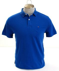 Men's Tommy Hilfiger Blue Short Sleeve Polo Shirt Gender:       Men Brand:         Tommy Hilfiger Style #:       78D5758 479 Style:          Short Sleeve Polo Shirt Color:          Blue (2) Button Polo Neckline Ribbed Knit Collar & Cuff Trim Tommy Hilfiger Logo Embroidered on the Upper Left 100% Cotton ***Measurements Available Upon Request International Buyers Please Note: Combined Shipping with Multiple Purchases Based on the Weight of Package Merchandise cannot be shipped as gift Custom forms Tommy Hilfiger Fashion, Polo Shirt Colors, Tommy Hilfiger Logo, Play Dress, Knit Collar, Short Sleeve Polo, Mens Polo Shirts, Blue Shirt, Blue Shorts