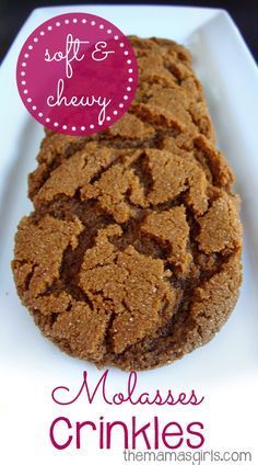 a close up of a plate of cookies on a table with the words soft & chewy molasses crinkles