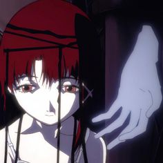 an anime character with red hair behind bars in a cage looking at someone's hand