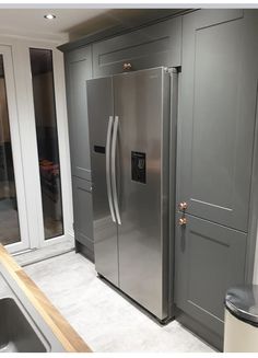 a large stainless steel refrigerator in a kitchen