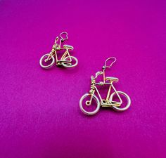 Bicycle Earrings Handmade Wire Work Dangle Earrings Studs in unworn vintage original condition Particularly beautiful handwork 4.5 x 3 cm - together weighing 2 grams gold-plated metal in unworn vintage original condition something completely different and also beautiful as a gift Vintage Wire Wrapped Brass Earrings, Vintage Brass Wire Wrapped Earrings, Bicycle Earrings, Earrings Studs, Handmade Wire, Wire Work, Earrings Handmade, Favorite Jewelry, Jewelry Earrings Dangle