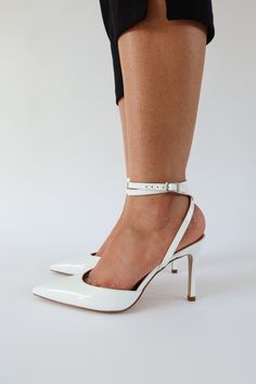 At our favorite heel height of 85mm/3. 35 inches, Iris is a total show stopper. She's sexy, classy, and reliable. With an elongated sharp toe and the security of a double wrap ankle strap, Iris is your new go-to pump. patent leather upper, silver hardware   wipe clean Patent Heels, August Birthstone Jewelry, July Birthstone Jewelry, Leather Socks, Bridal Look, Gifts For New Mums, Pearl Jewellery Earrings, August Birth Stone, Evil Eye Jewelry