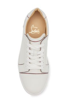 A signature logo details the heel counter and Louboutin red-inset at the sole of this leather sneaker trimmed with contrast piping. Lace-up style removable insole Wipe with a soft, dry cloth and store in a dust bag Leather upper and lining/synthetic sole Made in Italy Designer Shoes Classic Low-top Sneakers With Red Sole, Classic High-top Sneakers With Red Sole, Luxury Calf Leather High-top Sneakers With White Sole, Luxury Custom Low-top Calf Leather Sneakers, Luxury Lace-up High-top Sneakers With Contrast Sole, Classic High-top Sneakers With Contrasting Heel Counter, Designer Custom Low-top Sneakers With Contrasting Heel, Red Sole Low-top Calf Leather Sneakers, Low-top Calf Leather Sneakers With Red Sole