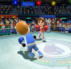 an animated image of two people boxing in a ring