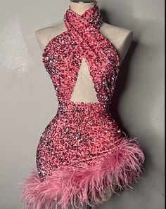 a mannequin with pink and black sequins on it's body