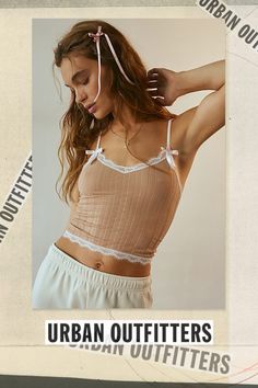 Better-than-basic Out From Under camisole in a slim, cropped fit. Designed in a soft pointelle knit featuring a sweetheart neckline and spaghetti straps. Topped with lace trim & bows for a sweet vibe. Only at Urban Outfitters. Features Out From Under Margot cami Lace trim tank top Soft & stretchy pointelle knit Sweetheart neckline with lace trim and spaghetti straps Bow details Lace trimmed hem Slim fit Cropped length Adjustable spaghetti straps UO exclusive Content + Care 94% Polyamide, 6% spandex Machine wash Imported Size + Fit Model in White is 5’10" and wearing size Small Measurements taken from size Small Chest: 20" Length: 17" | Out From Under Margot Cami in Brown, Women's at Urban Outfitters Cute Fitted Crop Top With Spaghetti Straps, Feminine Fitted Cropped Camisole, Fitted Cropped Feminine Camisole, Fitted Feminine Cropped Camisole, Fitted Pointelle Knit Camisole For Summer, Trendy Lace Trim Camisole Crop Top, Spring Pointelle Knit Cami Camisole, Spring Pointelle Knit Camisole, Feminine Fitted Cami Crop Top