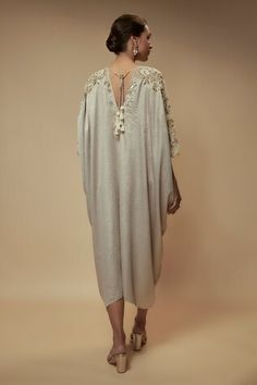 Beige kaftan embellished by sequin bead floral motifs and pearl embellishments in a asymmetric gathered silhouette. - Aza Fashions Bohemian Hand Embellished Dresses For Reception, Elegant Kaftan With Embroidered Neckline And Traditional Drape, Elegant Embroidered Kaftan With Traditional Drape, Embroidered V-neck Kaftan For Weddings, Summer Evening Embroidered Kaftan, Embellished V-neck Kaftan For Wedding, Bohemian Wedding Kaftan Embellished, Elegant Wedding Kaftan With Embroidered Neckline, Bohemian Embellished Wedding Kaftan