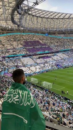 a soccer stadium filled with lots of people