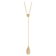 Created in 18 karat yellow gold Diamonds 1.90 carats approx. 24 inch, adjustable lariat Limited edition Exquisitely hand-crafted from 18 karat yellow gold, this limited-edition Mogul Gemstone Sword Pendant is adorned with approximately 1.90 carats of dazzling diamonds. The adjustable lariat chain measures 24 inches in length. About the Designers ~ Dharmesh & Namrata Drawing inspiration from little things, Dharmesh & Namrata Kothari have created an extraordinary and refreshing collection of luxurious jewels. True believers of destiny, they always feel that the possibilities of design - and life - are limitless when people work together. Formed in 2003, Syna Jewels has grown through enduring relationships with well known, established companies and have evolved by creating many successful col Luxury Yellow Gold Lariat Necklace With Detachable Pendant, People Working Together, Necklace With Diamonds, Gold Lariat Necklace, Rope Necklace, Lariat Necklace, Drawing Inspiration, Destiny, Gold Diamond