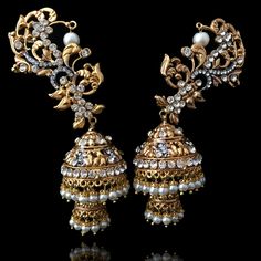 Inspired by the beautiful earrings Sonam Kapoor wore at the Cannes festival- we made another version and boy are they stunning!Made on brass and then gold and rhodium plated. Elegant Jeweled Earrings For Reception, Gold Jeweled Chandbali Pearl Earrings, Elegant Jeweled Chandbali Pearl Earrings, Elegant Metal Ear Cuff For Weddings, Ornate Jeweled Earrings For Festive Occasions, Festive Metal Jeweled Earrings, Gold Metal Ear Cuff For Wedding, Gold Jeweled Bridal Earrings For Reception, Gold Earrings With Intricate American Diamond Design