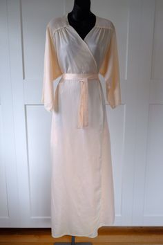 Vintage 'Character' for 'Lord + Taylor' Silk Blend Dressing Gown/Robe. 55% Nylon, 29% Polyester, 16% Silk. 3/4 length sleeves. Lovely shoulder detail. 2 pockets. Original sash at waist. Also ties on the inside. Original tag size Medium. True to size. Length: 56" Very good, vintage condition. A few dirt marks, needs a clean. Condition reflected in price. Pink Nightgown, Dressing Gown Robe, Vintage Character, Dressing Gown, Beautiful Gowns, Women Lingerie, Night Gown, Gowns Dresses, Length Sleeve